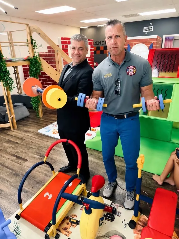 Community supporters with donated play items