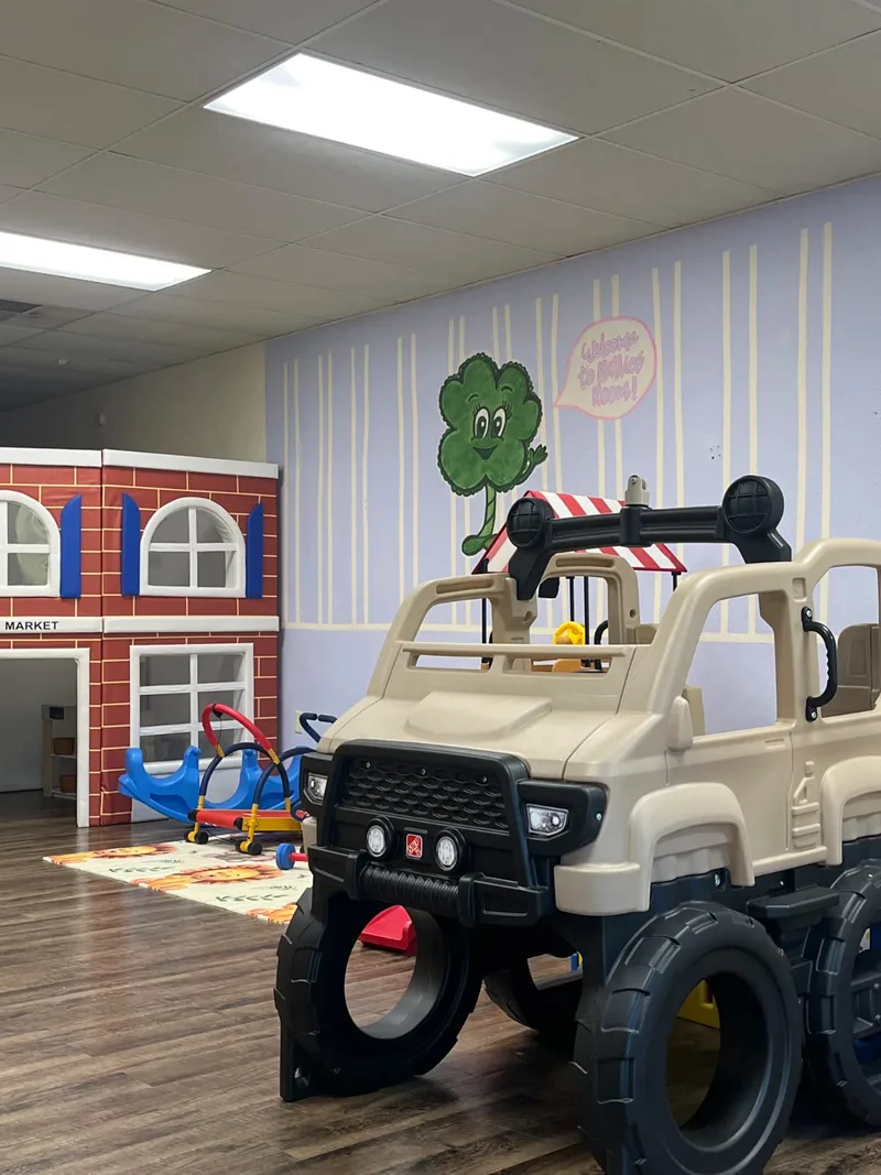 Large ride-on jeep in the indoor play space